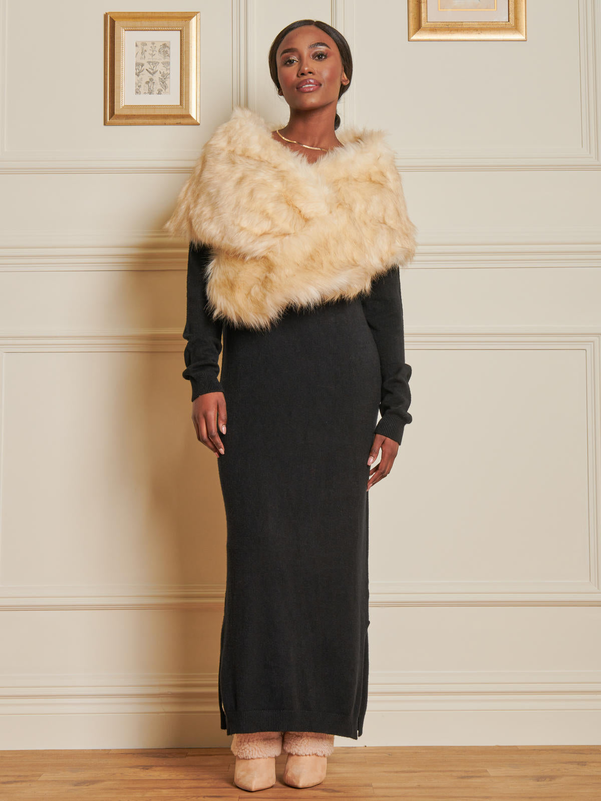 Black dress shop with fur shawl