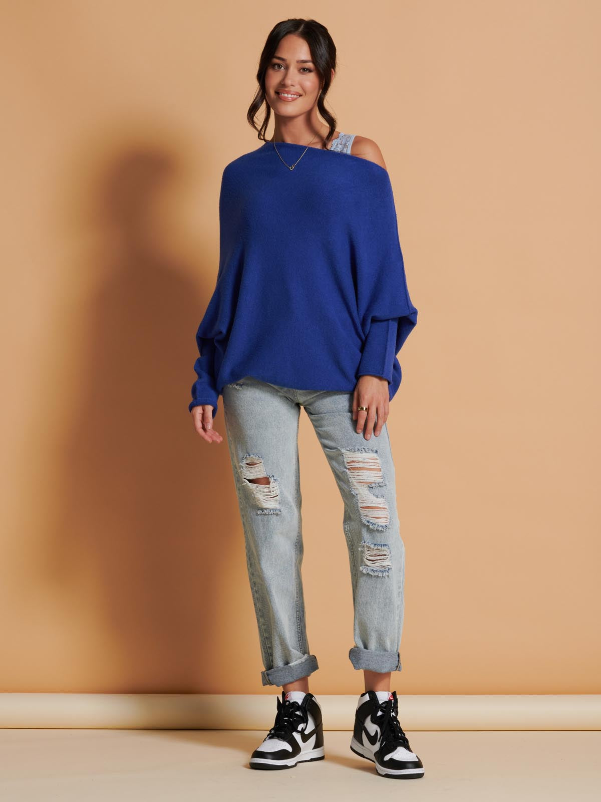 Navy off shoulder clearance jumper