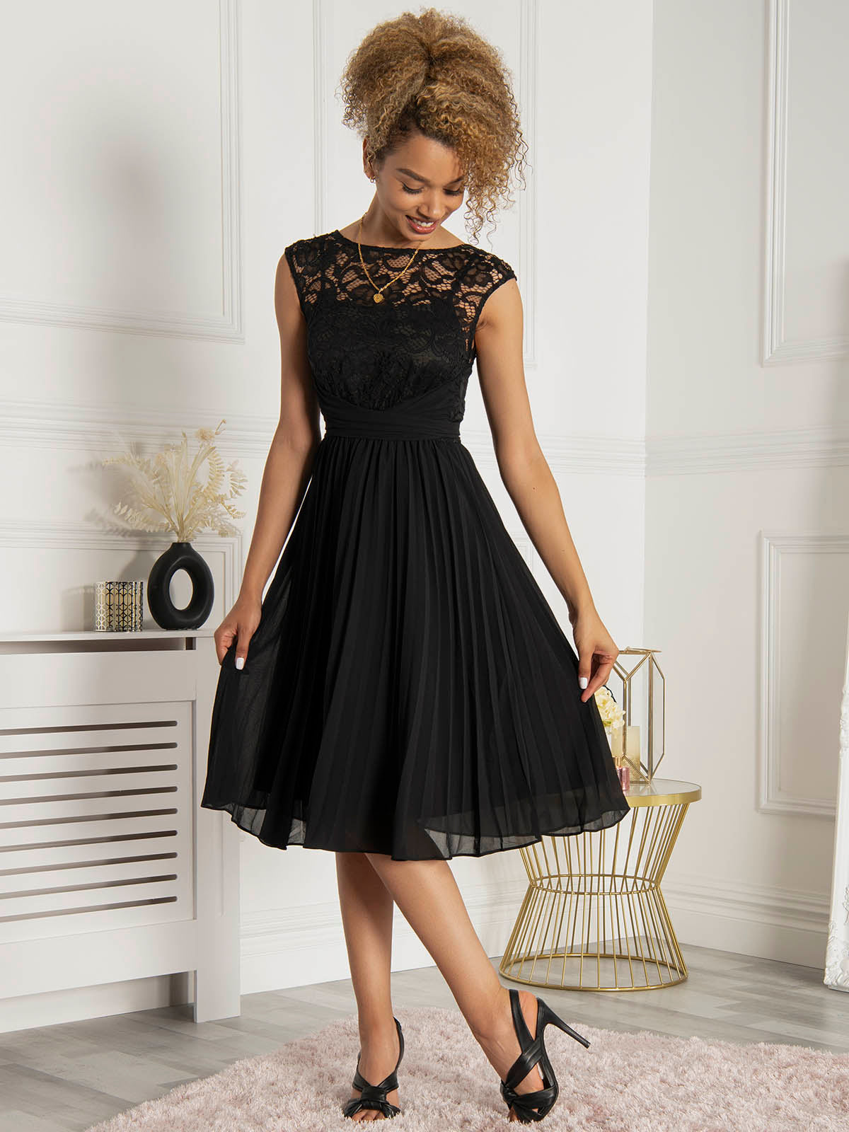 Brynn Whitfield's Black Satin Lace Puff Sleeve Dress